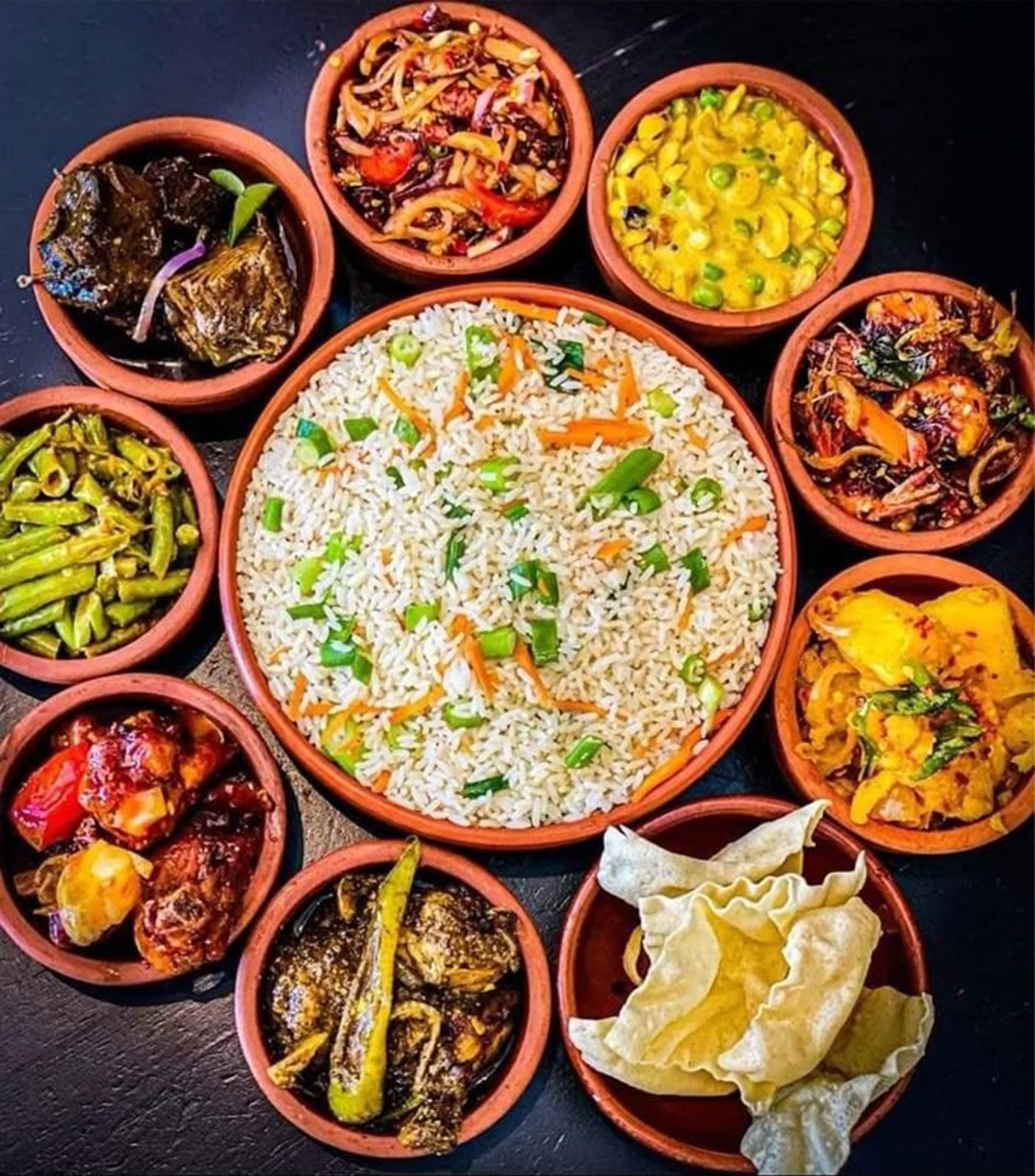 A Sri Lankan buffet spread of clay-pot curries and rice at Hambu Café